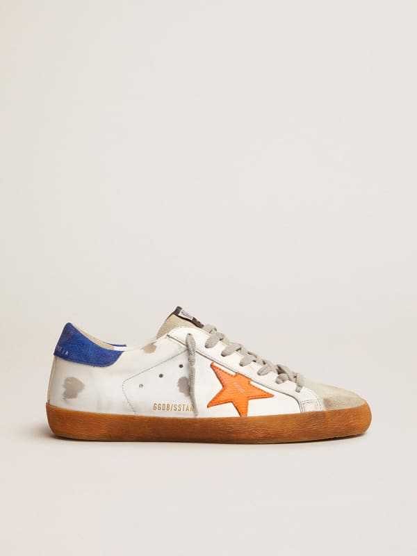 Super-Star sneakers with blue suede heel tab and neon orange star ...
