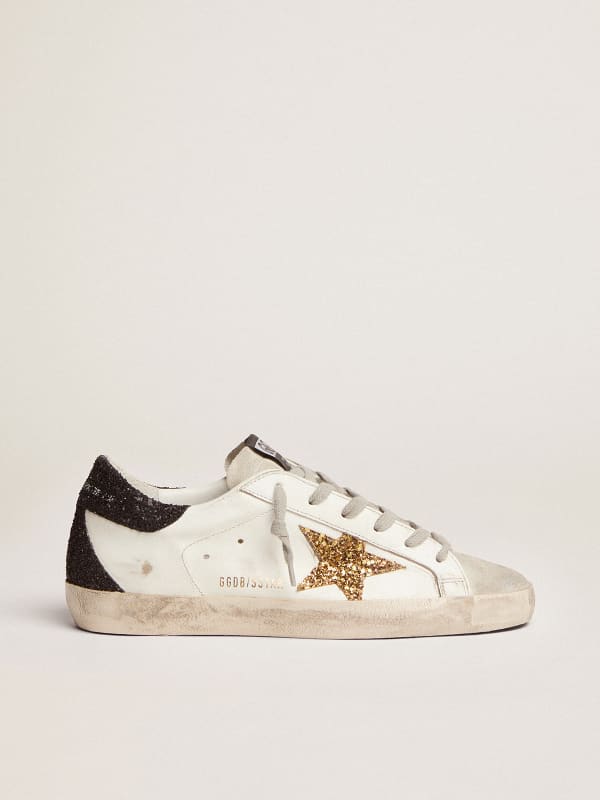 Women's Super-Star with gold star and black glitter heel tab | Golden Goose