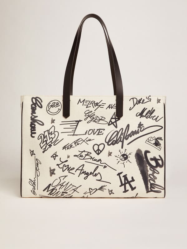 White East-West California Bag with contrasting black graffiti print ...