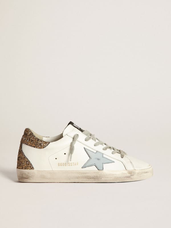 Super-Star sneakers with light blue leather star and gold glitter crocodile- print heel tab | Golden Goose