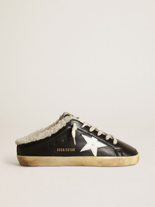 Super-Star Sabots in black nappa leather with white leather star and beige  shearling lining | Golden Goose
