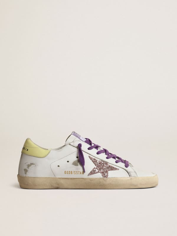 white ball star sneakers with gold star and blue heel tab