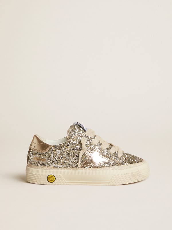 May Young in platinum glitter with metallic leather star and heel tab