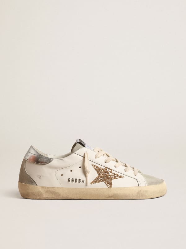 Women's Super-Star with gold glitter star and ice-gray suede inserts | Golden Goose
