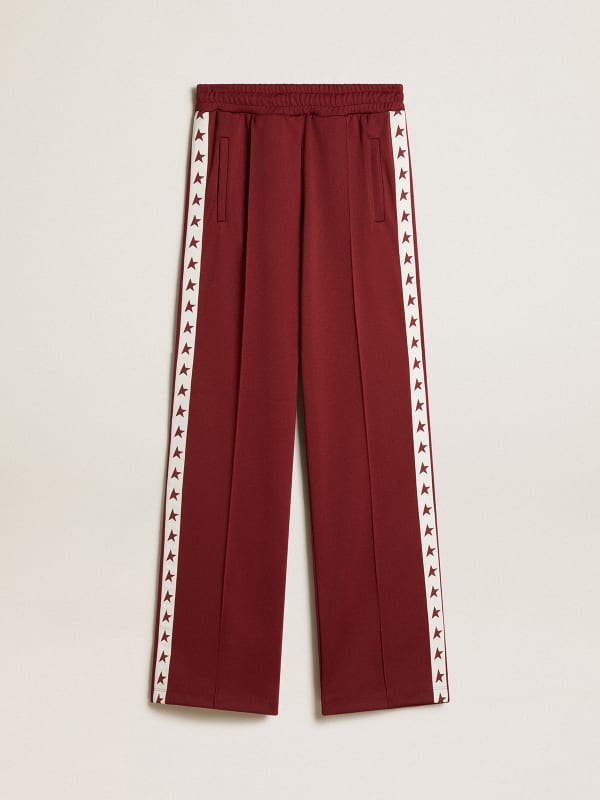 Women’s burgundy joggers with stars on the sides | Golden Goose