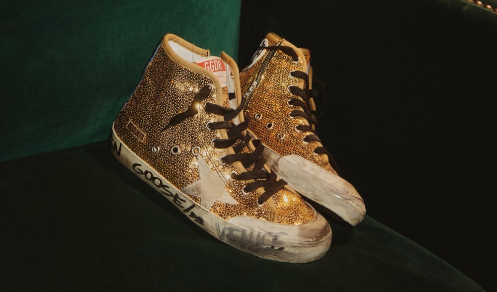 glittered-gold-francy-sneaker-with-black-marker-writing-on-sole
