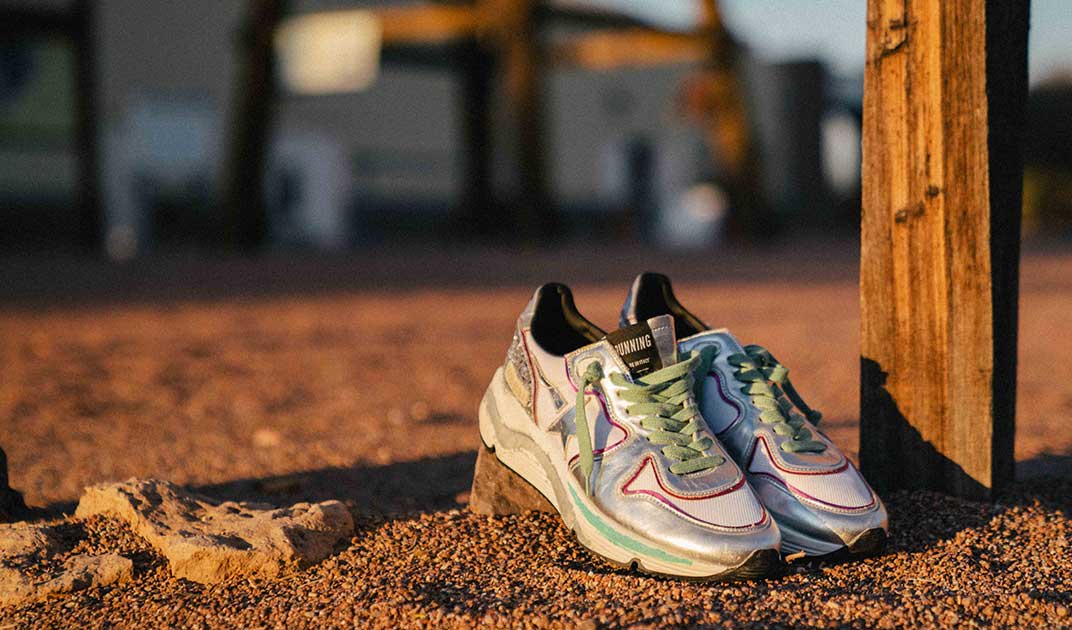 pink sneakers with silver bottom