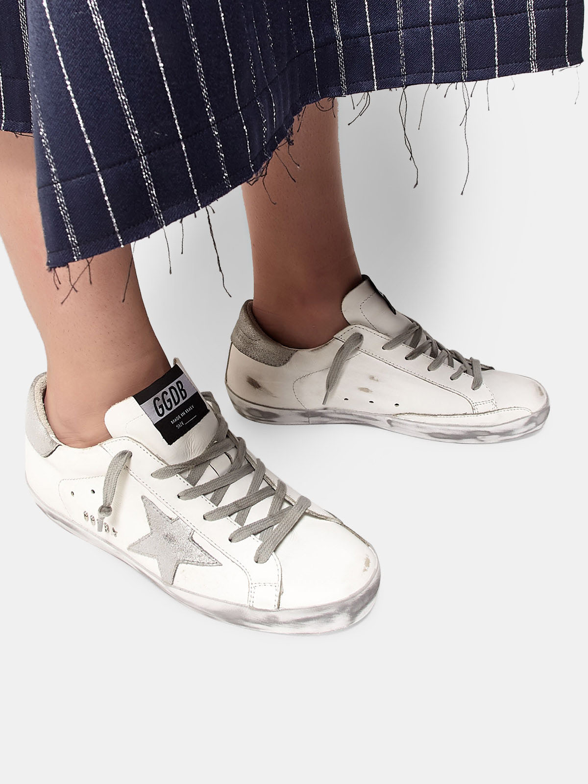 superstar sneakers with silver sparkle foxing and metal stud lettering