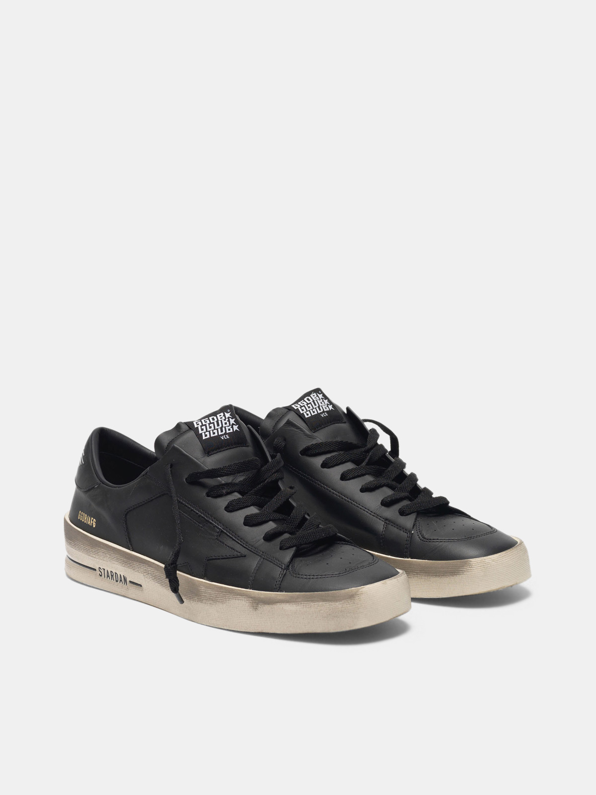 Stardan sneakers in total black leather with vintage finish | Golden Goose