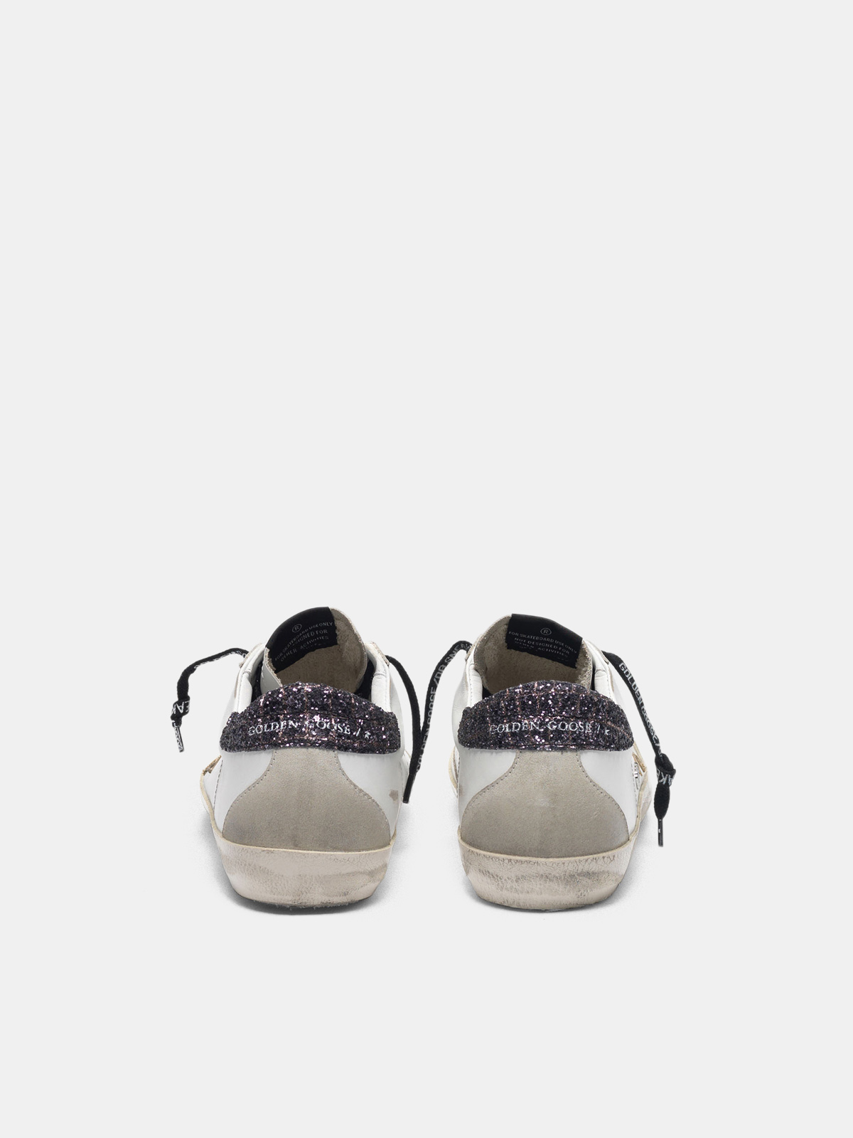 superstar sneakers with gold star and glittery black heel tab