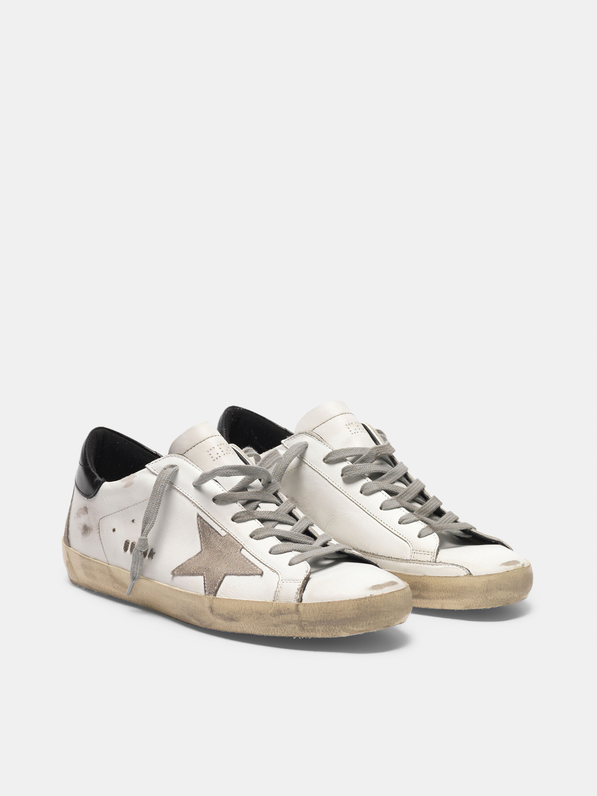 Men's Super-Star with black heel tab and metal stud lettering