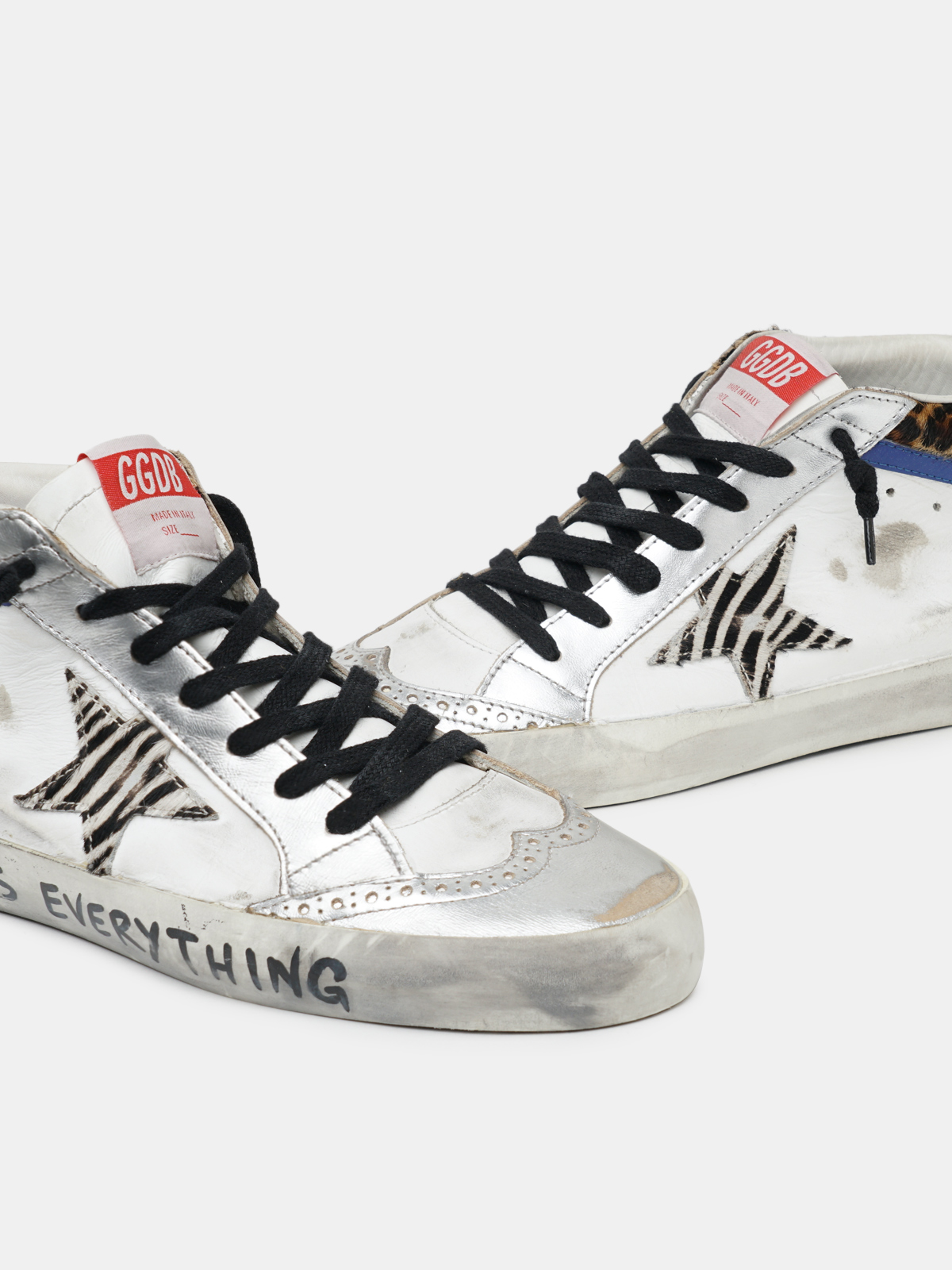 Mid Star sneakers with animal-print details and handwritten lettering |  Golden Goose