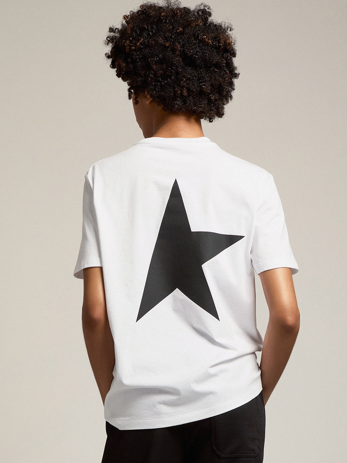 Women's white T-shirt with contrasting black logo and star