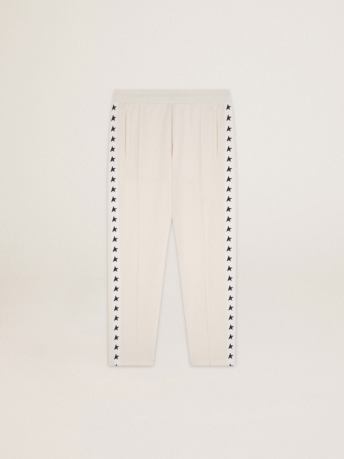 Pantalón jogger de hombre en color blanco con estrellas negras en los lados  | Golden Goose