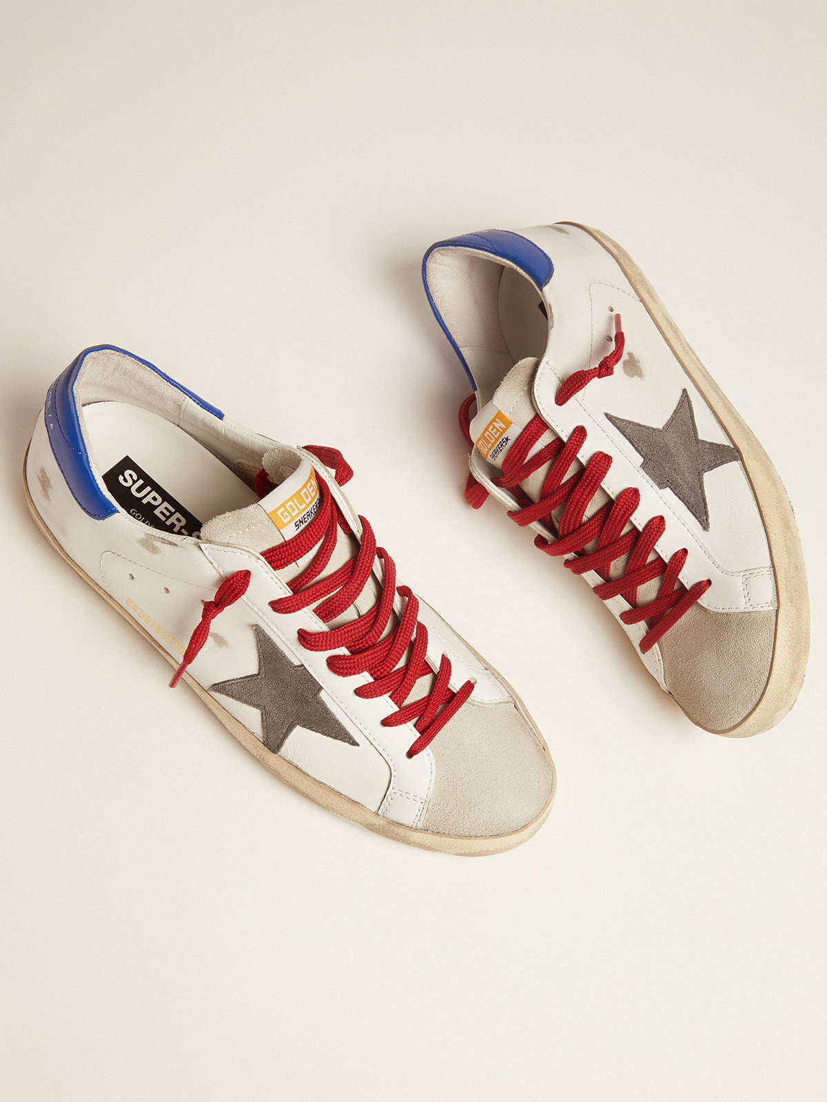 Super Star sneakers with blue heel tab and red laces Golden Goose