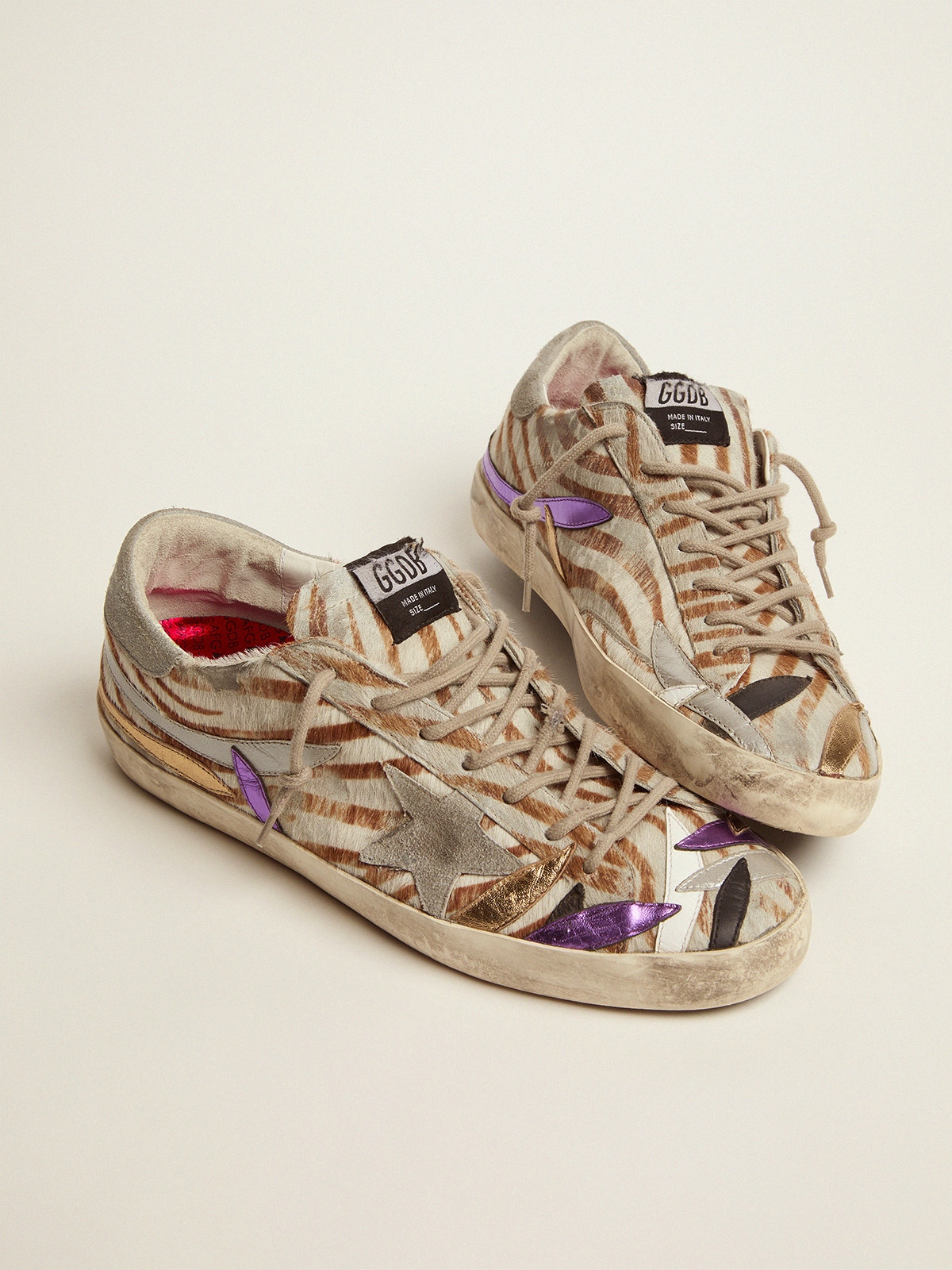 Super-Star sneakers in zebra-print pony skin with colored petals 