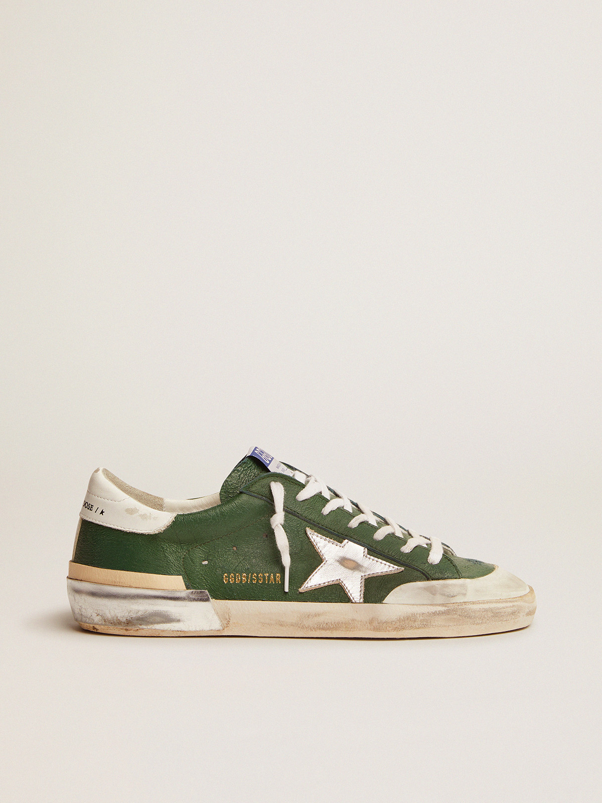 Super-Star in green leather and multi-foxing | Golden Goose