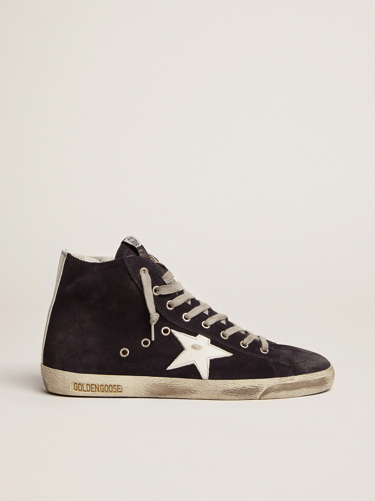 Francy sneakers in leather with leather star and heel tab | Golden 