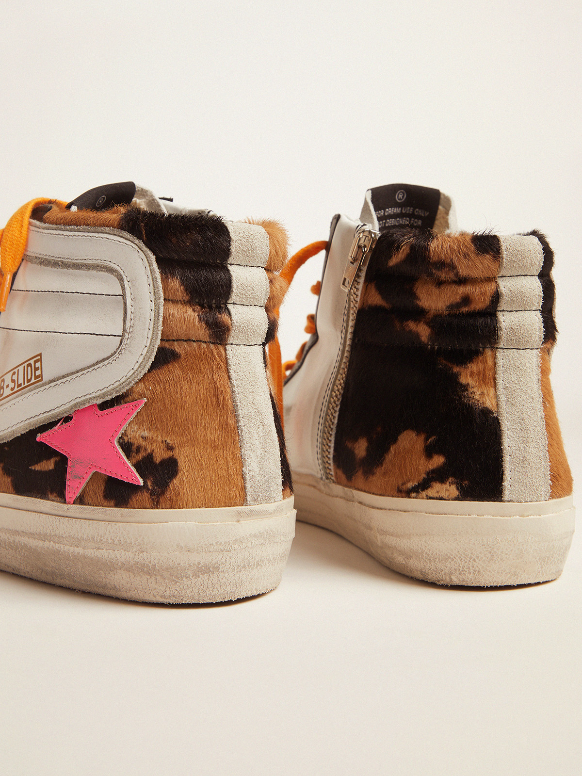 Slide sneakers in pony skin with orange laces and a fuchsia star | Golden  Goose