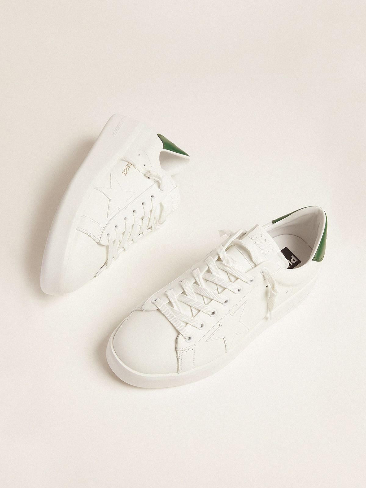 White Purestar sneakers with green heel tab | Golden Goose