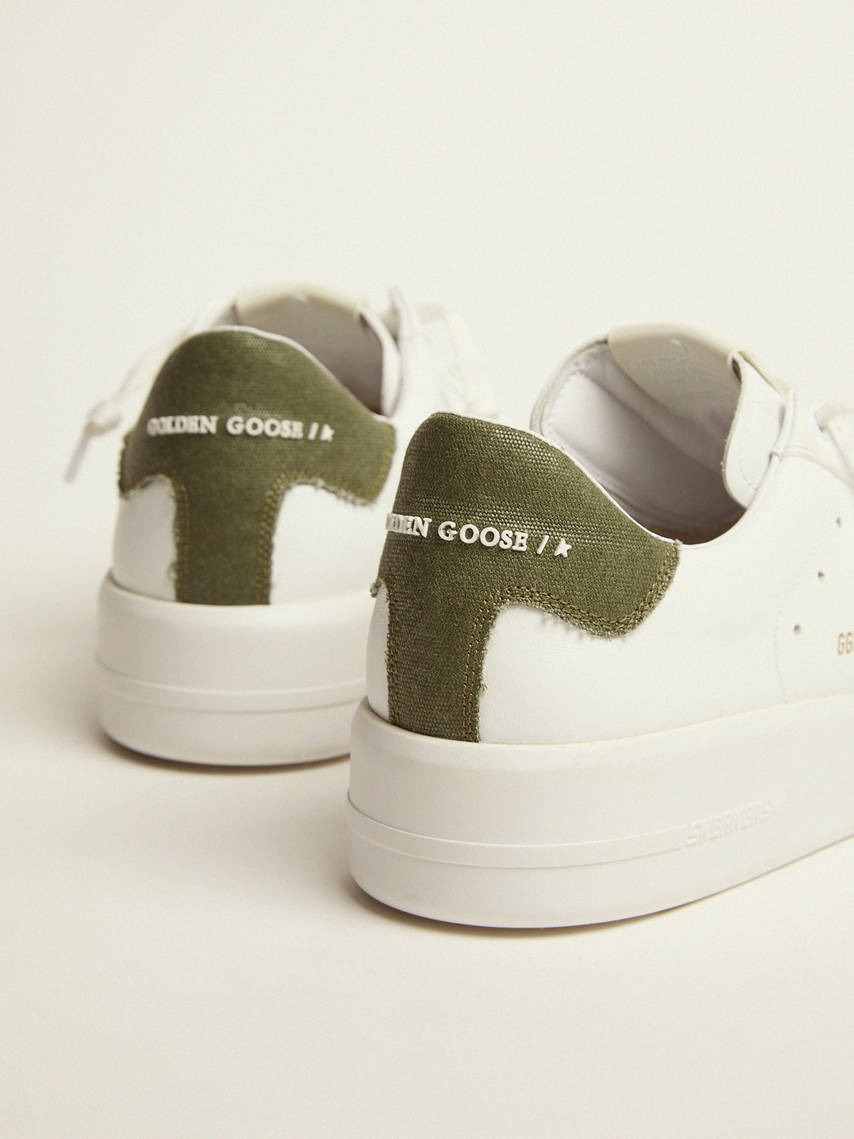 Purestar sneakers in white leather with green canvas heel tab | Golden Goose
