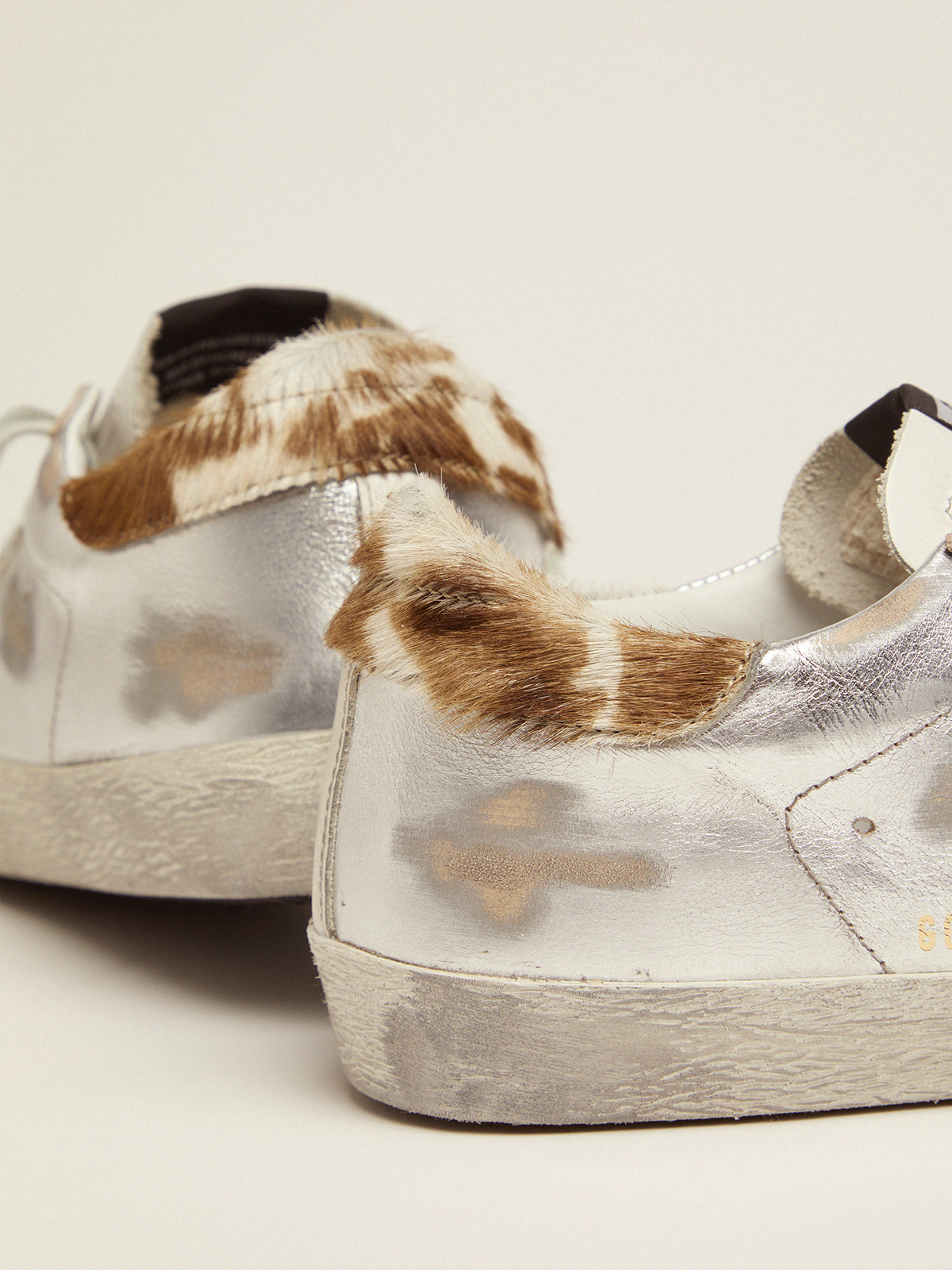Laminated Super-Star sneakers with animal-print heel tab | Golden Goose