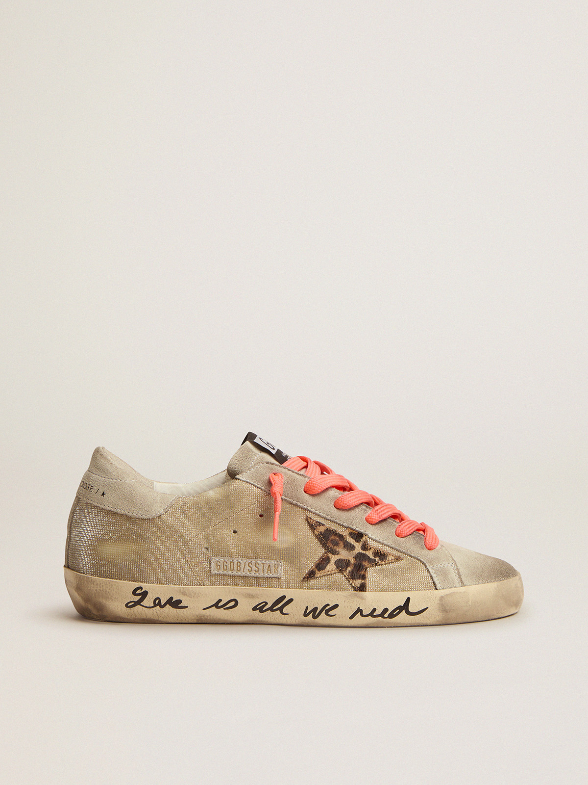 Sneakers with writing store on them