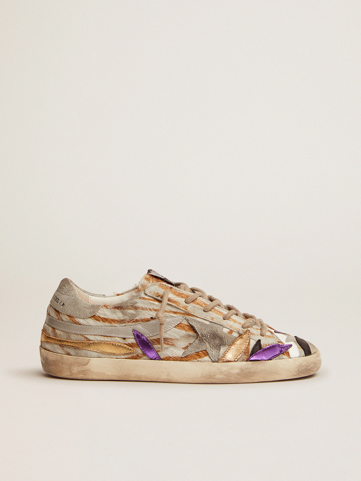 Super-Star sneakers in zebra-print pony skin with colored laminated leather  petals | Golden Goose