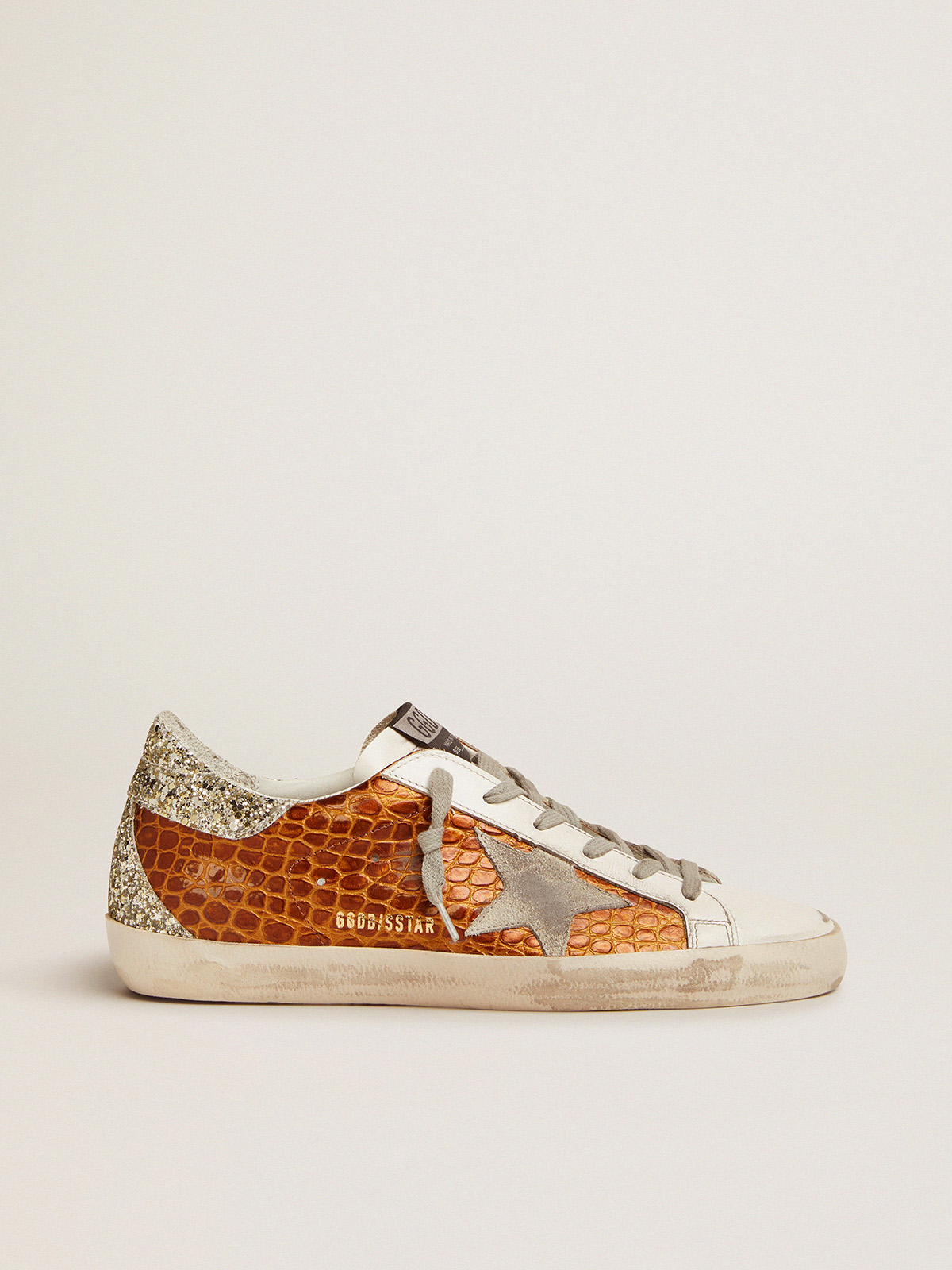 Super-Star sneakers in crocodile-print leather with light green glitter |  Golden Goose