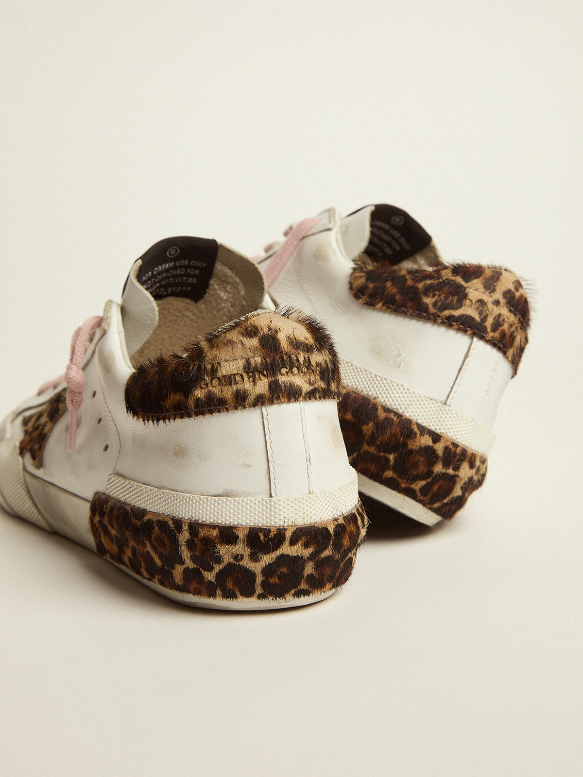 Super-Star sneakers in white leather with details and multi-foxing in  leopard-print pony skin | Golden Goose