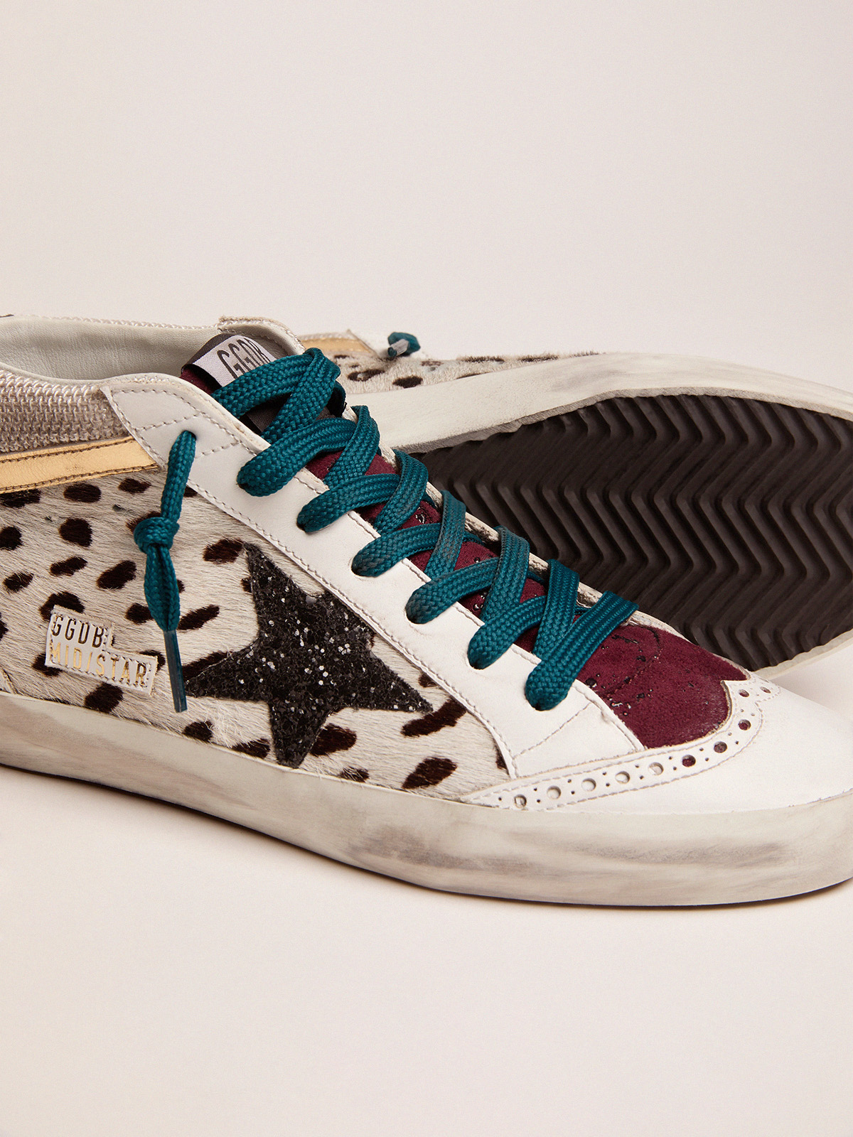 Golden goose mid star calf 2024 hair sneakers