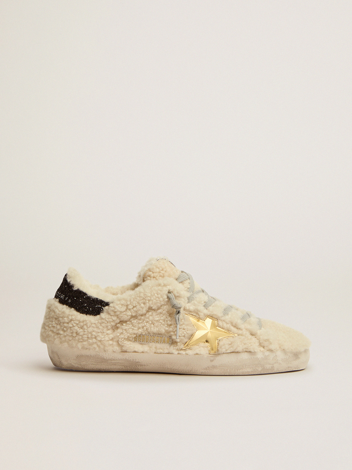 Super-Star sneakers in shearling with gold 3D star | Golden Goose