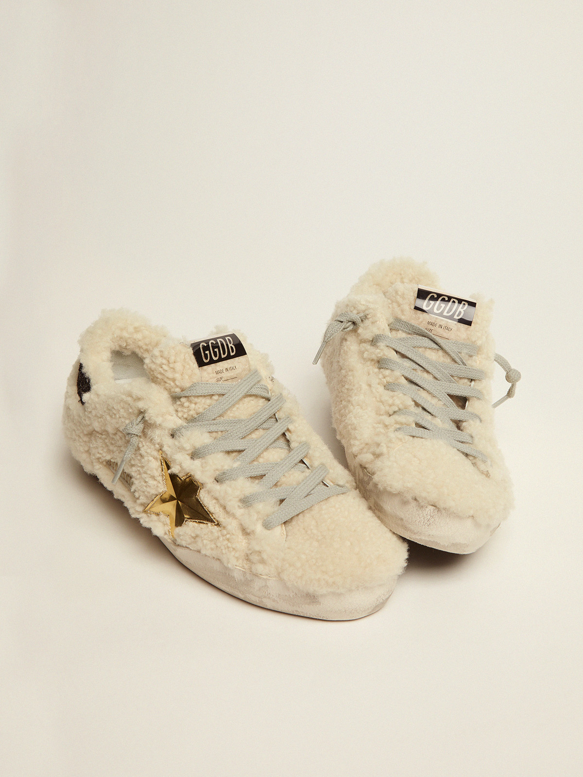 Super-Star sneakers in shearling with gold 3D star | Golden Goose