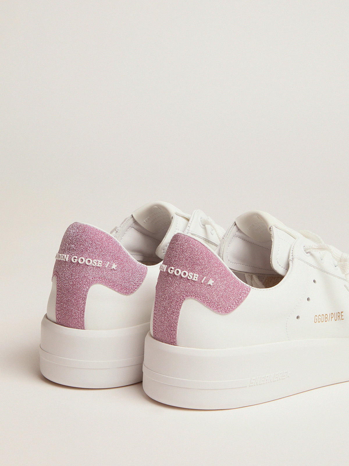 Purestar sneakers in white leather with pink glitter heel tab | Golden Goose