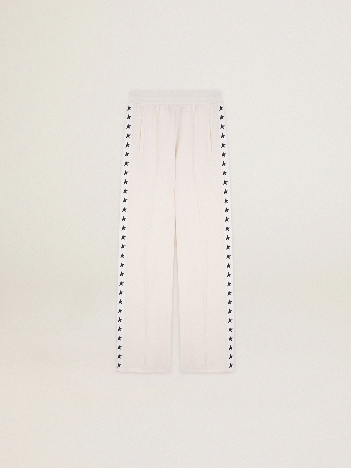 Women's white joggers with stars on the sides