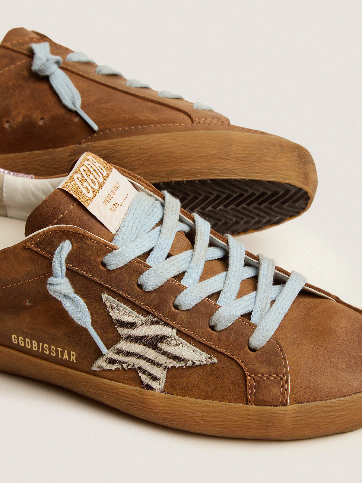 Super-Star sneakers in brown waxed suede with a zebra-print pony skin star  | Golden Goose