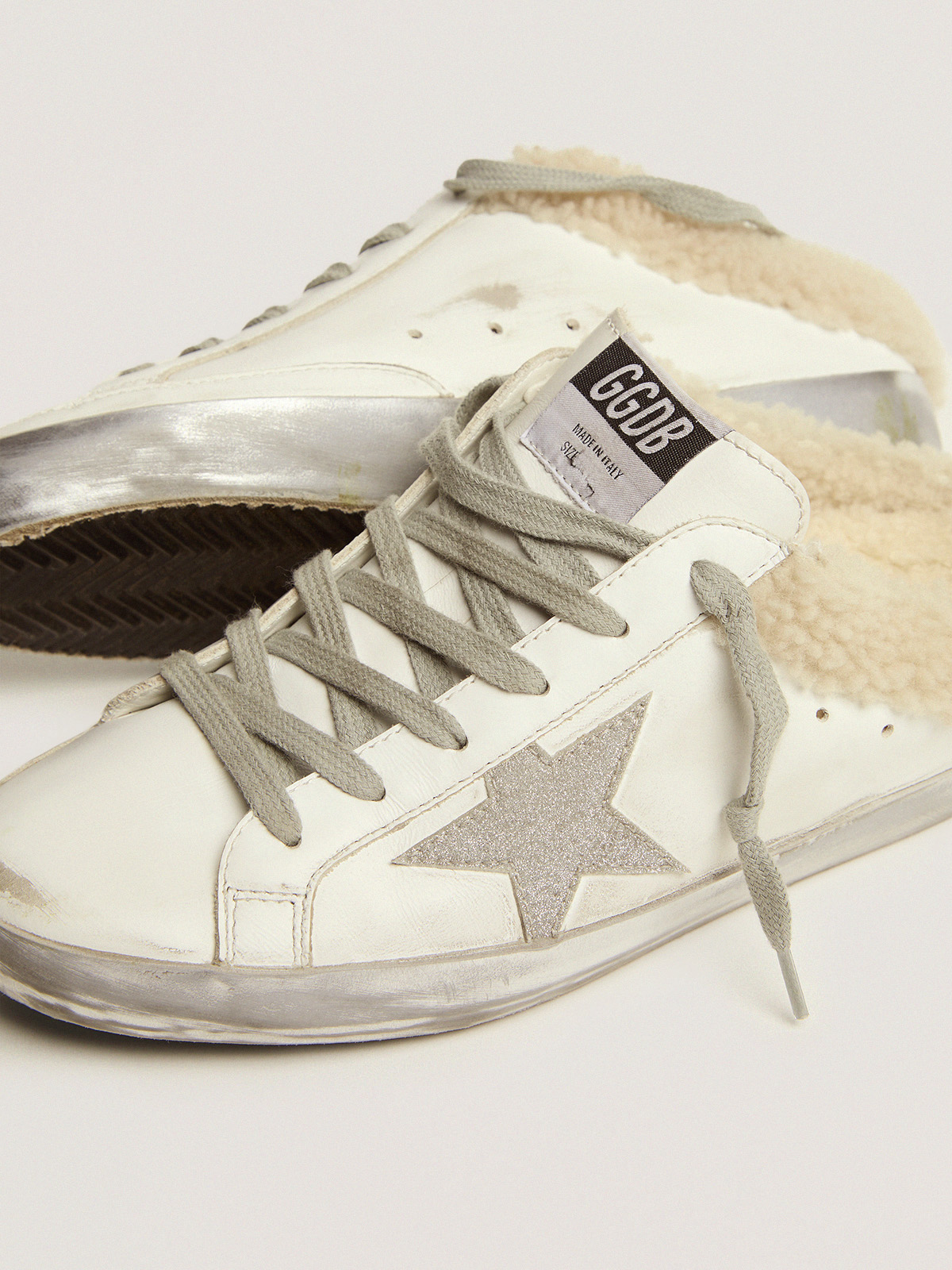 Super-Star Sabots in white leather with shearling lining | Golden