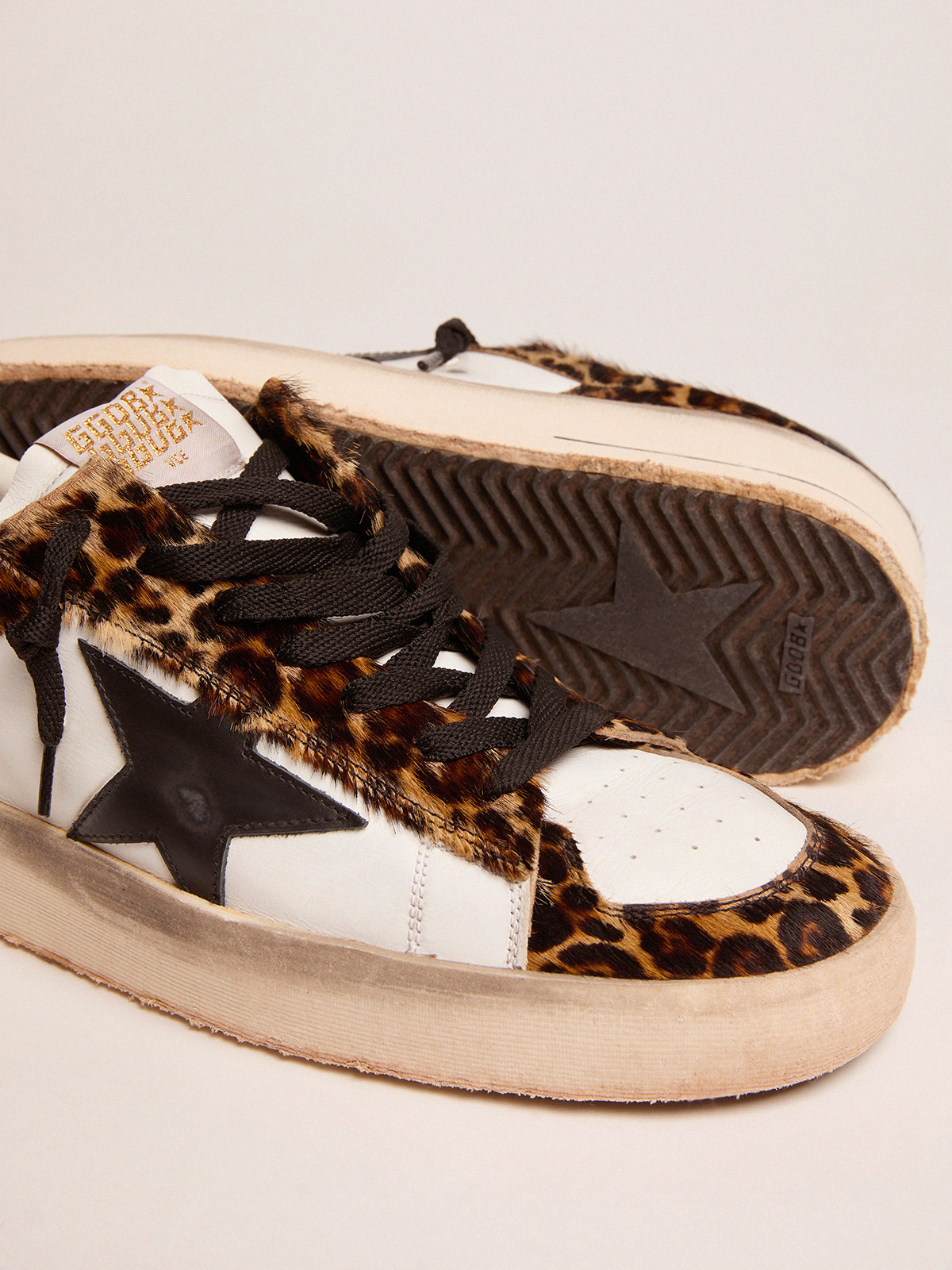 Stardan sneakers in leopard-print pony skin and black star | Golden Goose