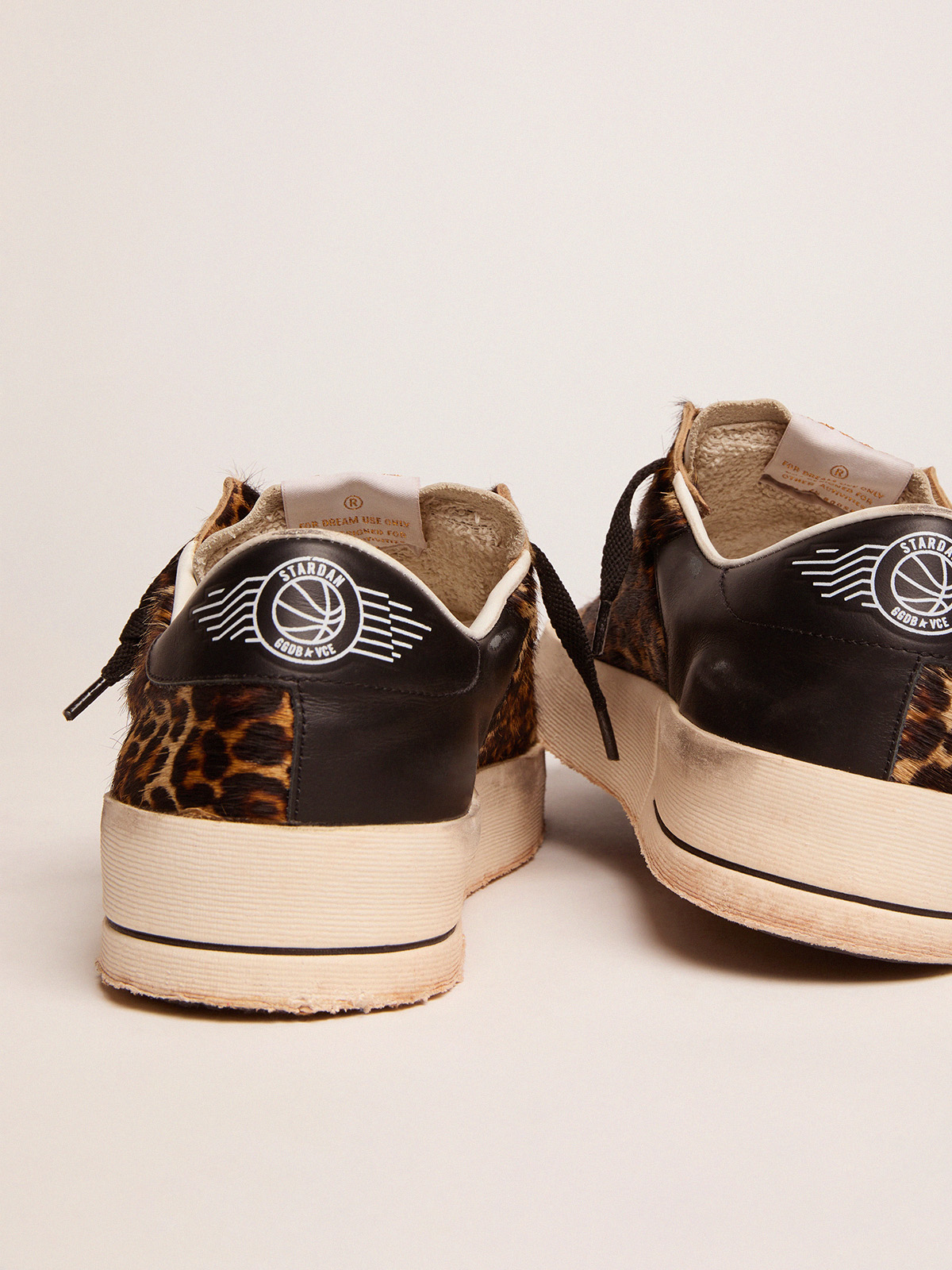 Stardan sneakers in leopard-print pony skin and black star | Golden Goose