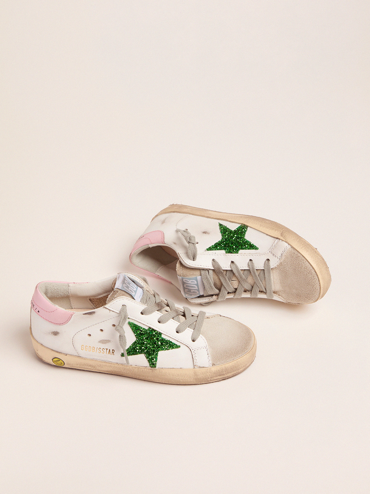 Super-Star sneakers with green glitter star and pink heel tab 