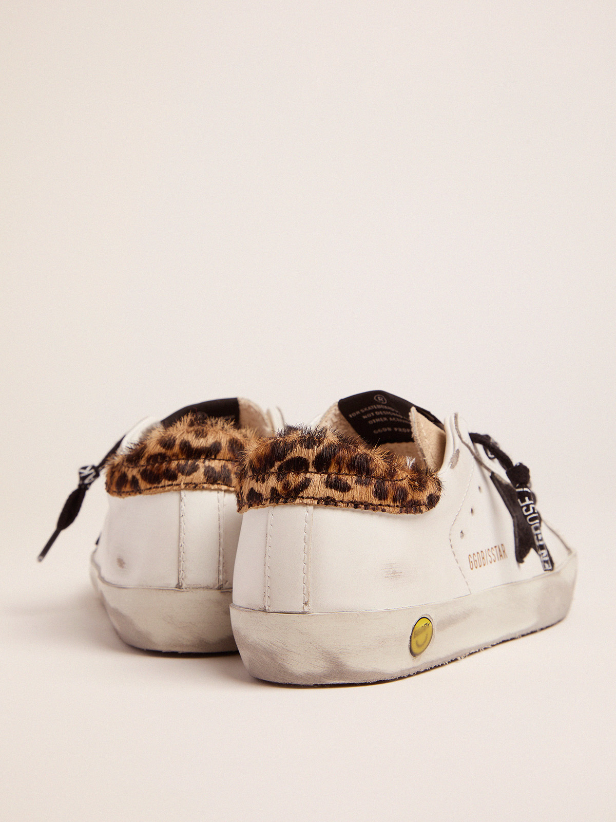 Young Super-Star sneakers with leopard-print pony skin heel tab and black  star | Golden Goose