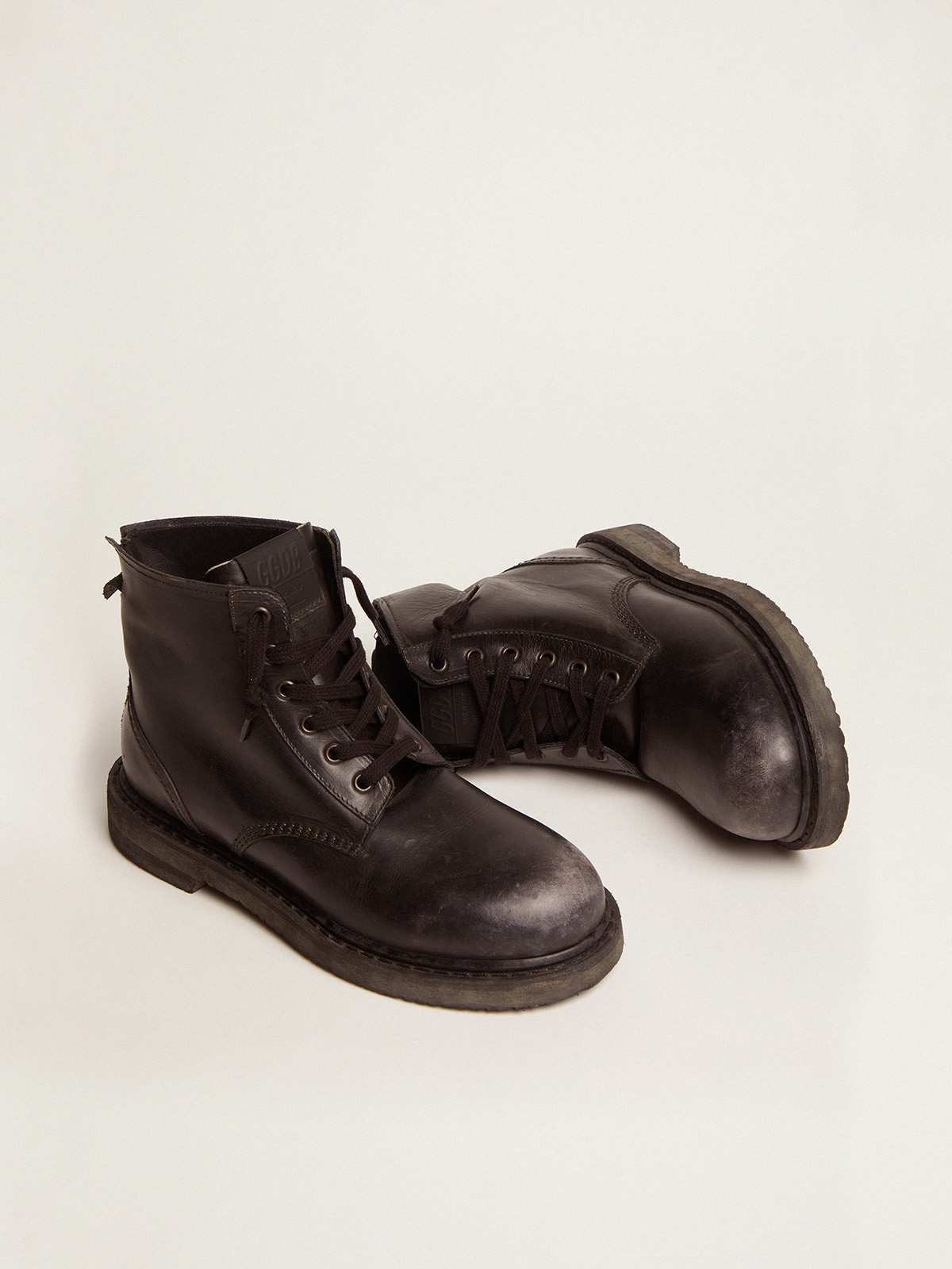 ryste sum stole Women's boots in black leather | Golden Goose