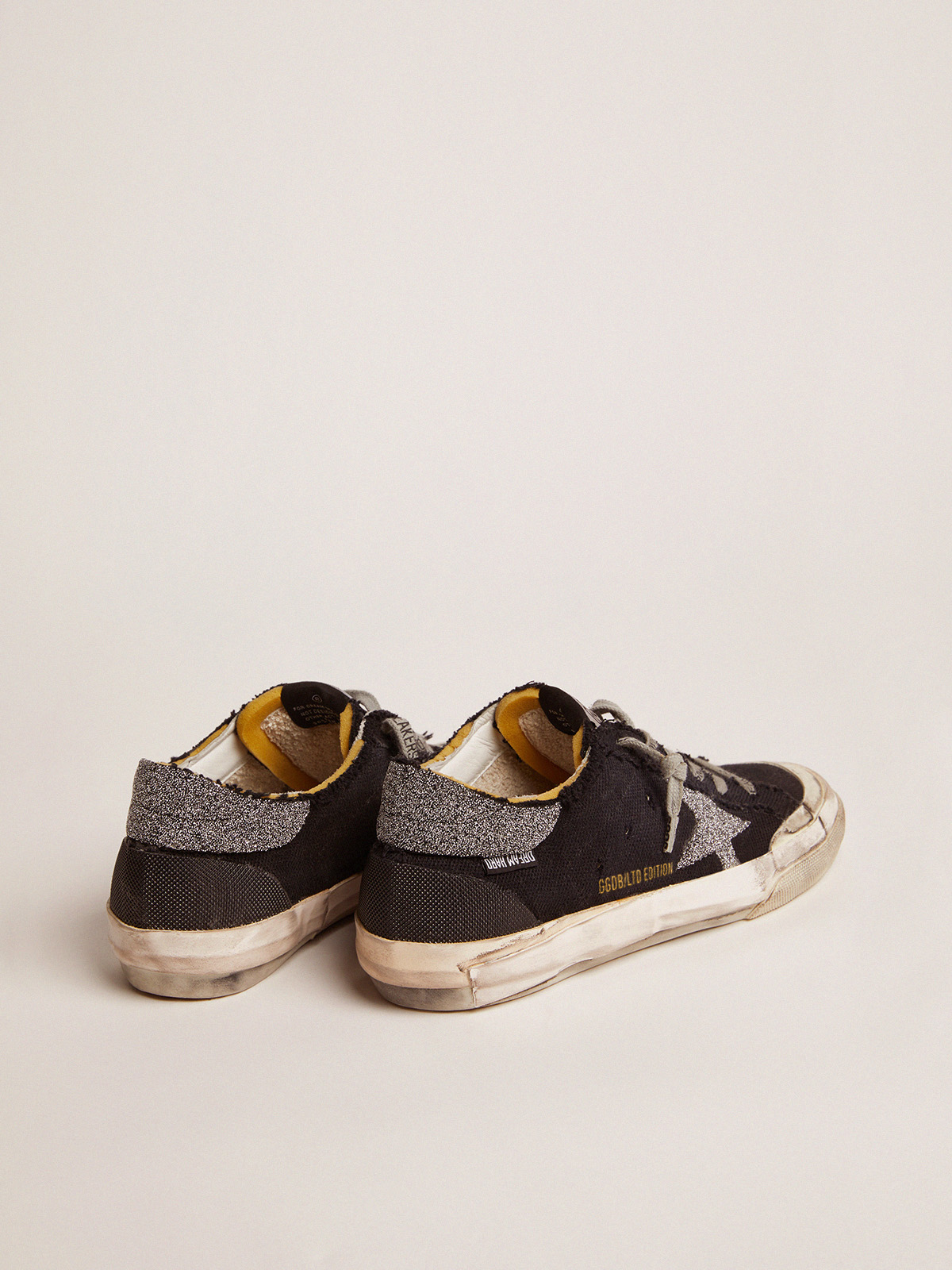 Super-Star Penstar LAB sneakers in black distressed canvas with crystal star  and heel tab | Golden Goose