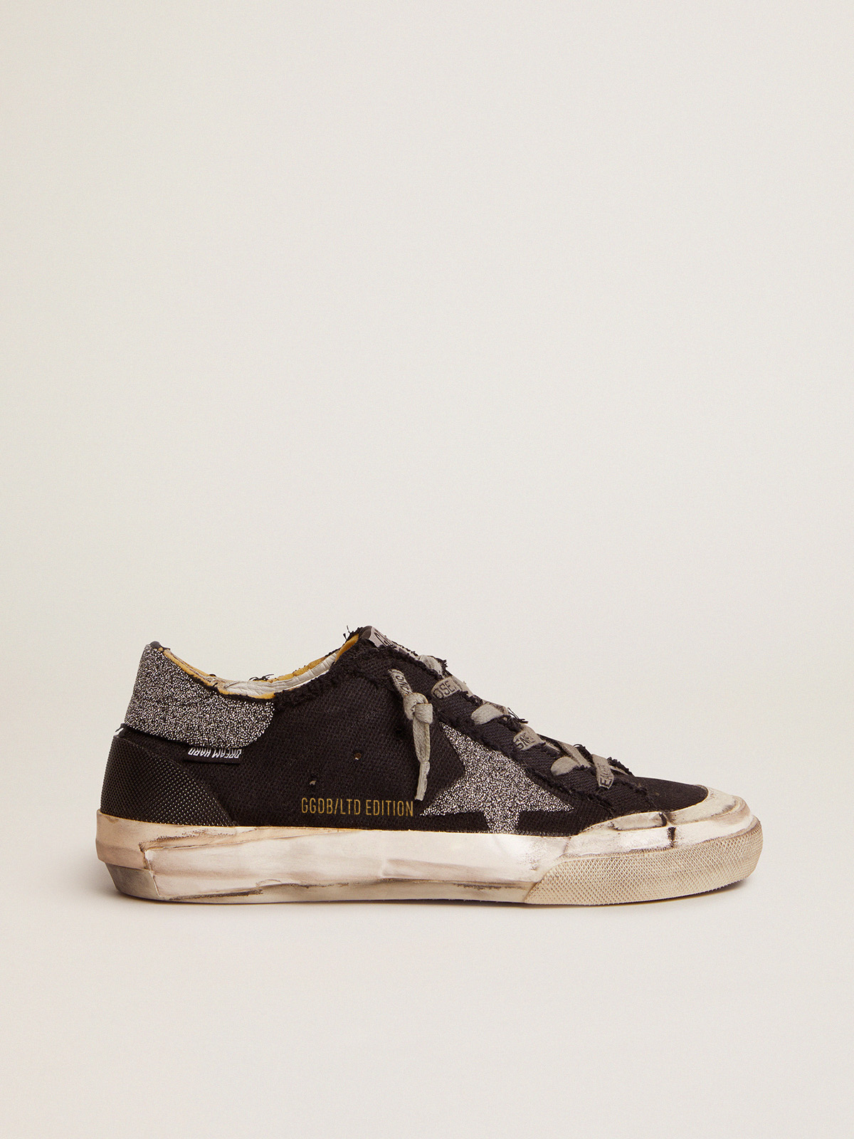 Super-Star Penstar LAB sneakers in black distressed canvas with crystal star  and heel tab | Golden Goose