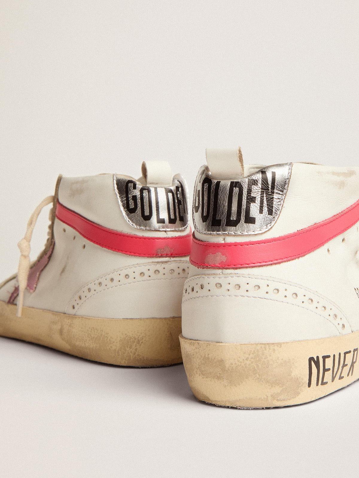 Mid Star sneakers in white leather with pink star and black lettering |  Golden Goose