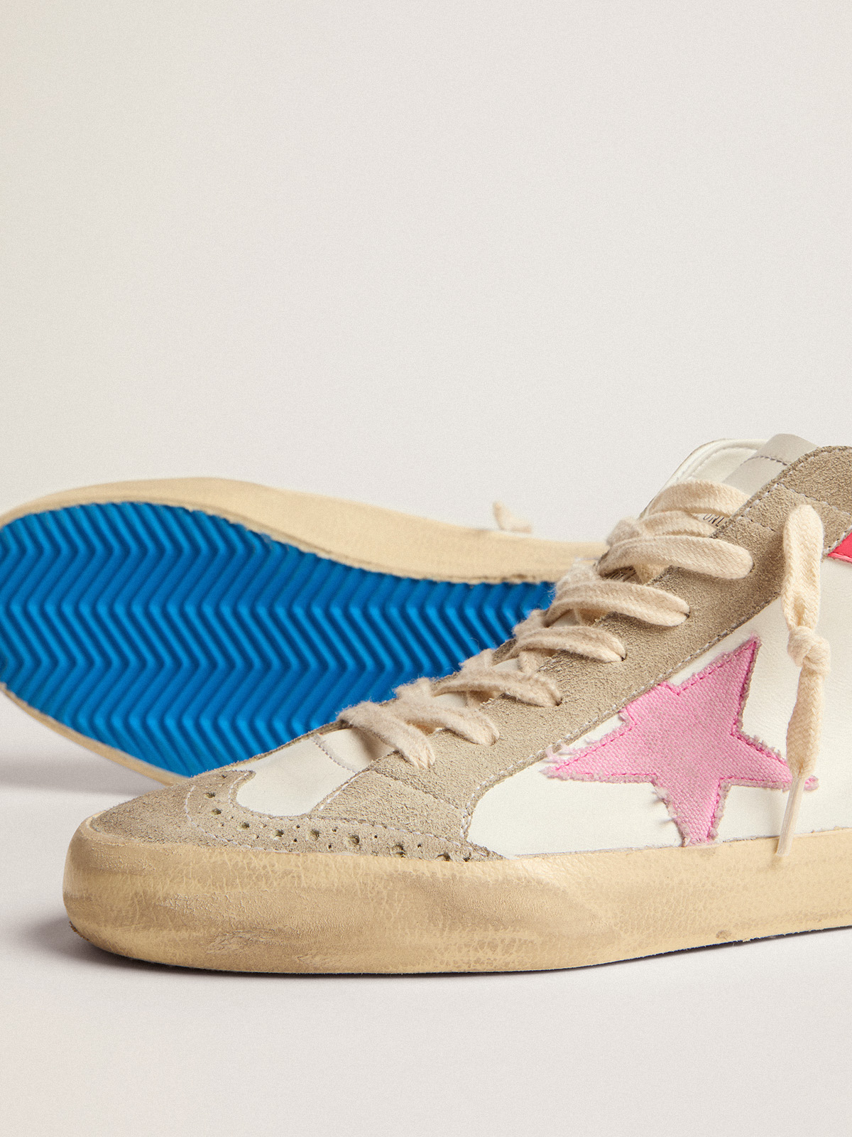 Mid Star sneakers in white leather with pink star and black lettering |  Golden Goose