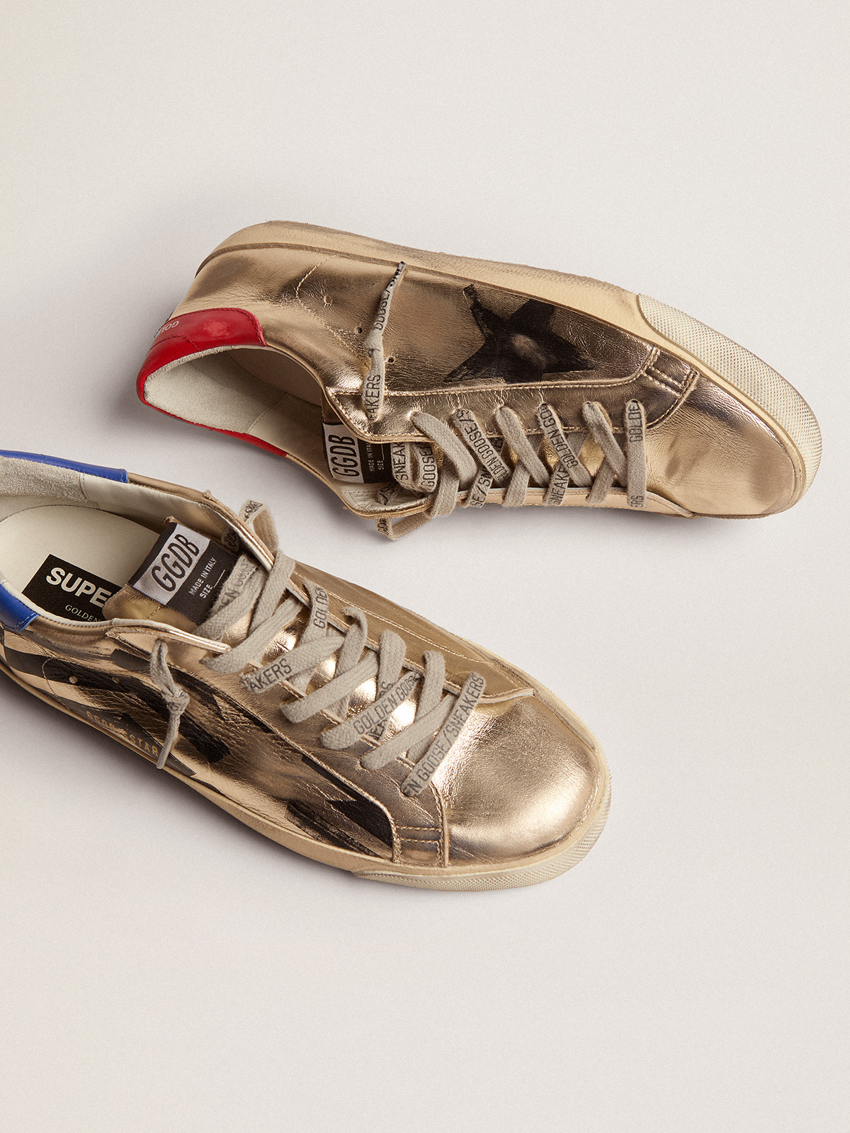 Super-Star sneakers in platinum-colored laminated leather with 
