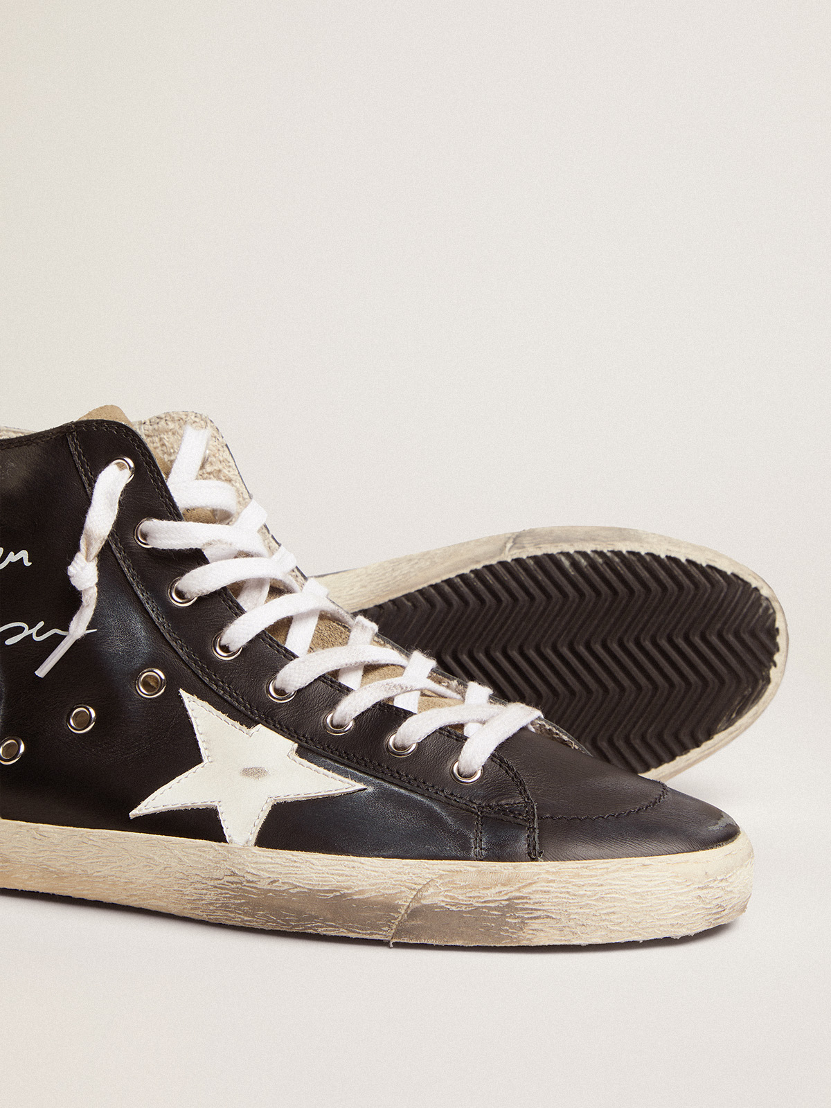 Francy sneakers with black leather upper and white leather star