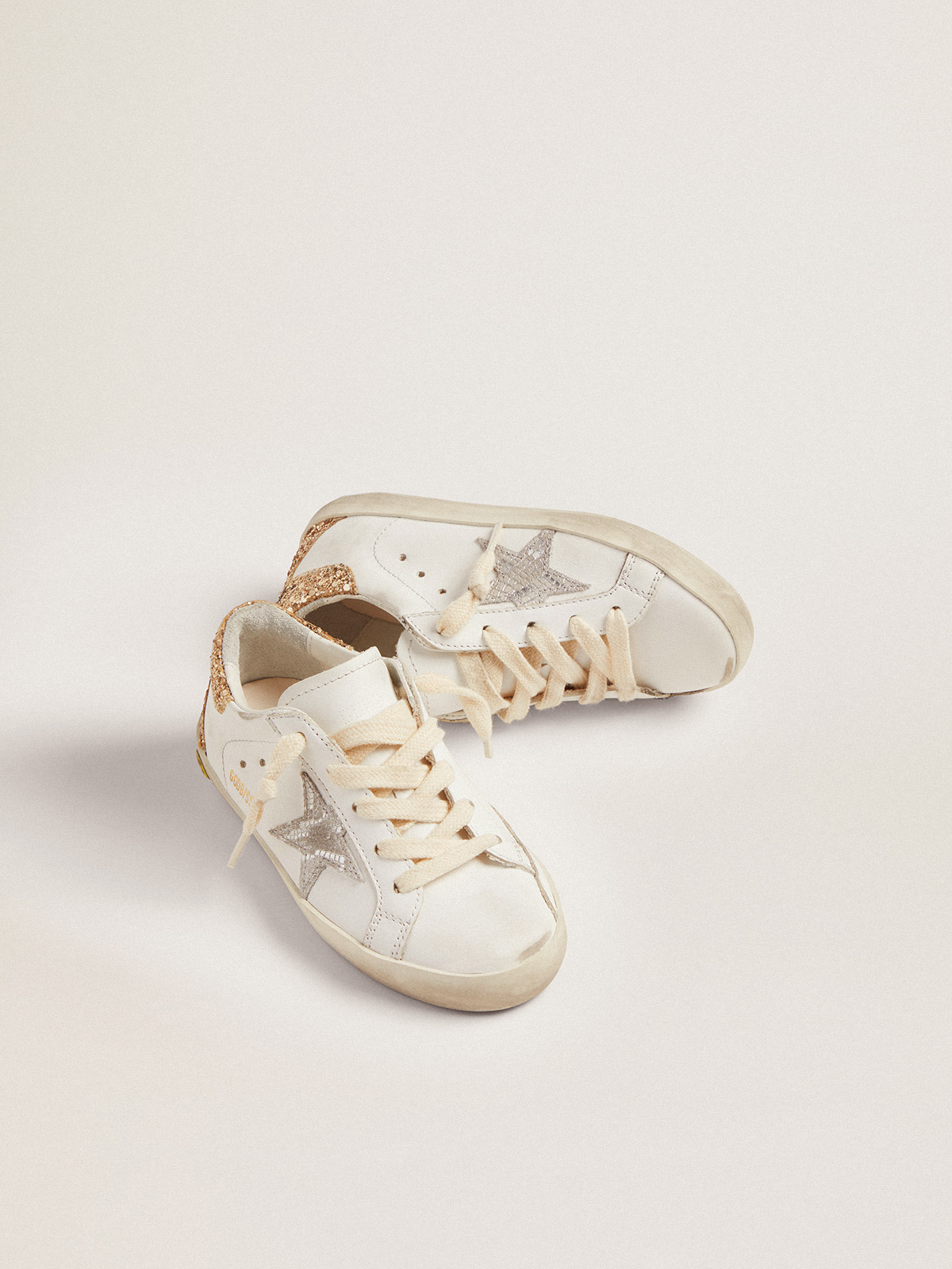 Super-Star sneakers with snake-print silver metallic leather star and gold  glitter heel tab | Golden Goose