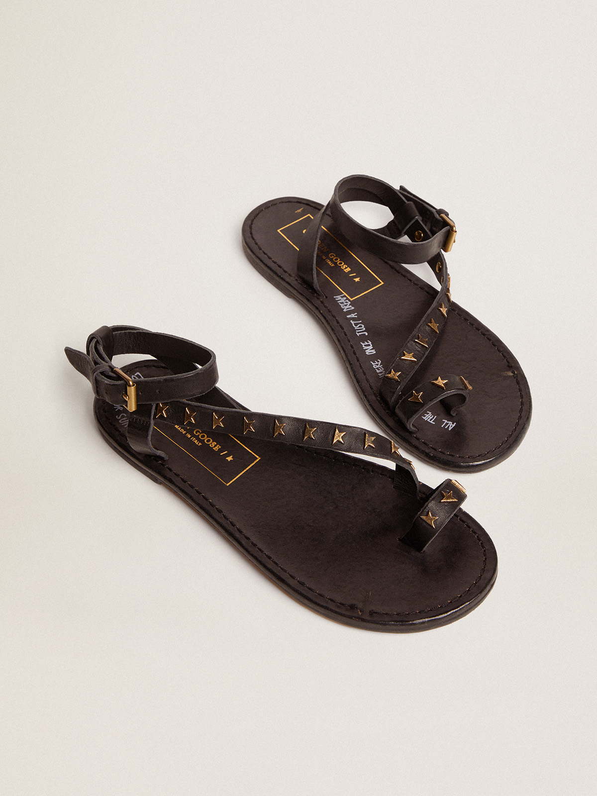 Black and best sale gold thong sandals